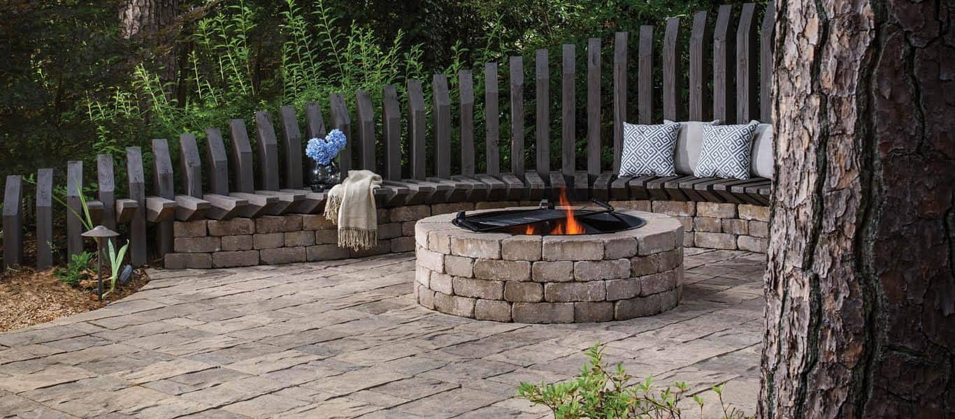 Outside brick Firepit with a bench
